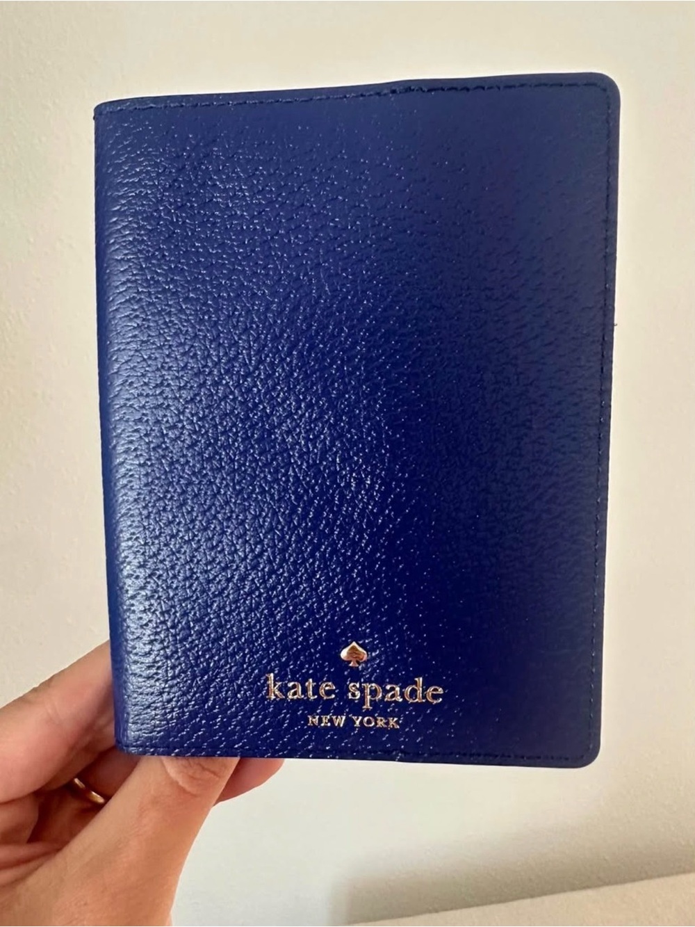 kate spade blue pebbled leather passport cover with gold logo NWT